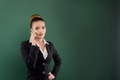 Smiling pretty businesswoman talks on the phone on green background Smiling pretty businesswoman talks on the phone on green background - PhotoDune Item for Sale