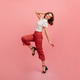 Inspired slim girl dancing on pink background. Studio shot of graceful trendy woman in black shoes. Inspired slim girl dancing on pink background. Studio shot of graceful trendy woman in black shoes. - PhotoDune Item for Sale