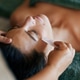 Woman receiving gua sha therapy at spa Woman receiving gua sha therapy at spa - PhotoDune Item for Sale