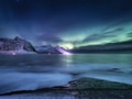 Aurora Borealis light. Stars trails and northern light. Senja island, Norway Aurora Borealis light. Stars trails and northern light. Senja island, Norway - PhotoDune Item for Sale