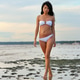 Beautiful Asian Woman In White Bikini At Sea Beautiful Asian Woman In White Bikini At Sea - PhotoDune Item for Sale