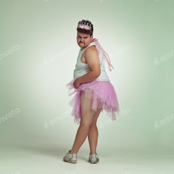 man dressed as fairy Man Dressed As Fairy Hanging In Air Portrait High-Res Stock Photo