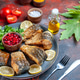 Front view (fried fish) on the turqoise plate with lemon slices pomegranate seeds and greens was p Front view (fried fish) on the turqoise plate with lemon slices pomegranate seeds and greens was p - PhotoDune Item for Sale