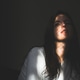 A portrait of a young woman half of her face is the shadow A portrait of a young woman half of her face is the shadow - PhotoDune Item for Sale