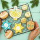 Celebrating Hanukkah. The concept of the Hanukkah holiday. Celebrating Hanukkah. The concept of the Hanukkah holiday. - PhotoDune Item for Sale