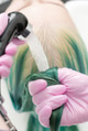 Professional Hairdresser Washes Long Green Hair of Client in Sink with Water from Shower Professional Hairdresser Washes Long Green Hair of Client in Sink with Water from Shower - PhotoDune Item for Sale