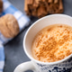 Blue cup of salep milky hot drink of Turkey with cinnamon powder and sticks healthy spice Blue cup of salep milky hot drink of Turkey with cinnamon powder and sticks healthy spice - PhotoDune Item for Sale