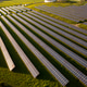 From above view of solar panels on agricultural land during sunny day From above view of solar panels on agricultural land during sunny day - PhotoDune Item for Sale