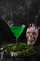 Halloween green cocktails with skulls, spiders and smoke on black Halloween green cocktails with skulls, spiders and smoke on black - PhotoDune Item for Sale
