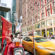 Vintage red truck on a bustling Manhattan street Vintage red truck on a bustling Manhattan street - PhotoDune Item for Sale
