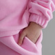 Pink fleece loungewear set with hood, pocket, and cuffs. Pink fleece loungewear set with hood, pocket, and cuffs. - PhotoDune Item for Sale