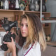 Beautiful teenage girl learns the basics of photography in an art class Beautiful teenage girl learns the basics of photography in an art class - PhotoDune Item for Sale