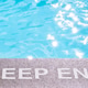 Deep End sign at the swimming pool Stock Photo by JulieAlexK | PhotoDune