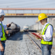Railway Engineers Coordinating Inspection at Rail Yard Railway Engineers Coordinating Inspection at Rail Yard - PhotoDune Item for Sale