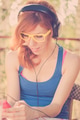 Beautiful hipster girl with headphones listening to the music Beautiful hipster girl with headphones listening to the music - PhotoDune Item for Sale