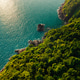 Beautiful golden light over the coast of Ko Chang island at sunrise. Tropical beach aerial view. Beautiful golden light over the coast of Ko Chang island at sunrise. Tropical beach aerial view. - PhotoDune Item for Sale