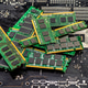 A stack of old SDRAM memory modules lying on a printed circuit board. A stack of old SDRAM memory modules lying on a printed circuit board. - PhotoDune Item for Sale