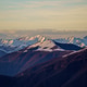 Snow-Dusted Mountain Peaks at Sunset near Piani di Bobbio in Italy Snow-Dusted Mountain Peaks at Sunset near Piani di Bobbio in Italy - PhotoDune Item for Sale