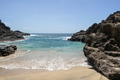 Beautiful peaceful Hawaii landscape with the pretty blue ocean on a rocky beach. Beautiful peaceful Hawaii landscape with the pretty blue ocean on a rocky beach. - PhotoDune Item for Sale