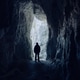 Scary photo of a dark silhouette inside a cave Scary photo of a dark silhouette inside a cave - PhotoDune Item for Sale