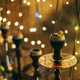 Single Hookah With Glowing Charcoal Against Fairy Light Bokeh Single Hookah With Glowing Charcoal Against Fairy Light Bokeh - PhotoDune Item for Sale