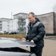 Man inspecting car engine experiencing vehicle breakdown Man inspecting car engine experiencing vehicle breakdown - PhotoDune Item for Sale
