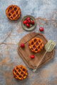 Flat lay of three cherry pies on a textured blue and rustic background Flat lay of three cherry pies on a textured blue and rustic background - PhotoDune Item for Sale