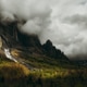 Ray of light on cliffs and forest in the french alps Ray of light on cliffs and forest in the french alps - PhotoDune Item for Sale