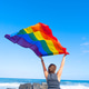 Woman holding lgbt flag Woman holding lgbt flag - PhotoDune Item for Sale