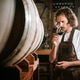 Winemaker Smelling Aroma of Red Wine in Cellar Winemaker Smelling Aroma of Red Wine in Cellar - PhotoDune Item for Sale