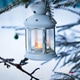 Christmas lantern with candle on branch of snowy winter tree, outdoors Christmas lantern with candle on branch of snowy winter tree, outdoors - PhotoDune Item for Sale