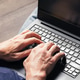Man typing on laptop keyboard. Hands working on computer. Remote work concept Man typing on laptop keyboard. Hands working on computer. Remote work concept - PhotoDune Item for Sale