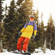 Man in helmet and ski mask snowboarding in a forest Man in helmet and ski mask snowboarding in a forest - PhotoDune Item for Sale