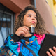 Brazilian woman enjoying coffee and tablet on balcony Brazilian woman enjoying coffee and tablet on balcony - PhotoDune Item for Sale