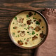 Creamy mushroom soup on wooden table Creamy mushroom soup on wooden table - PhotoDune Item for Sale