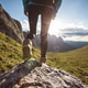 Hiking on sunset alpine mountain peak Hiking on sunset alpine mountain peak - PhotoDune Item for Sale