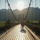 a tourist metal bridge against the backdrop of mountains a tourist metal bridge against the backdrop of mountains - PhotoDune Item for Sale