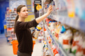 A young girl in a grocery supermarket A young girl in a grocery supermarket - PhotoDune Item for Sale