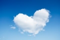 A cloud in the shape of a heart. A blue sky and a heart sign. Romance and love. A cloud in the shape of a heart. A blue sky and a heart sign. Romance and love. - PhotoDune Item for Sale