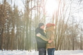 Happy Young Couple in Winter Park having fun. Family Outdoors. love Happy Young Couple in Winter Park having fun. Family Outdoors. love - PhotoDune Item for Sale