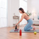 Woman taking a break after home workout, sitting on yoga mat with dumbbells Woman taking a break after home workout, sitting on yoga mat with dumbbells - PhotoDune Item for Sale