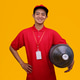 Smiling Delivery Man in Red Uniform Holding Large Water Gallon Under His Arm Smiling Delivery Man in Red Uniform Holding Large Water Gallon Under His Arm - PhotoDune Item for Sale