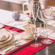 Dining table set and decorated for Christmas dinner. Home dining room in bokeh. Dining table set and decorated for Christmas dinner. Home dining room in bokeh. - PhotoDune Item for Sale
