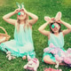 Cute little children wearing bunny ears on Easter day sitting on grass in garden Cute little children wearing bunny ears on Easter day sitting on grass in garden - PhotoDune Item for Sale