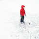 Young Child Playing Ice Hockey on Frozen Winter Lake in Red Jacket Young Child Playing Ice Hockey on Frozen Winter Lake in Red Jacket - PhotoDune Item for Sale