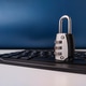 The image displays combination padlock resting on a computer keyboard, symbolizing digital security The image displays combination padlock resting on a computer keyboard, symbolizing digital security - PhotoDune Item for Sale