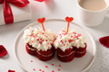 Red velvet cake in shape of hearts and coffee for Valentine's day. Red velvet cake in shape of hearts and coffee for Valentine's day. - PhotoDune Item for Sale