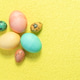 Painted Easter eggs on yellow background Painted Easter eggs on yellow background - PhotoDune Item for Sale