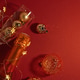 Champagne, flutes and Christmas Ornaments on Red Background for Festive New Year Celebration Champagne, flutes and Christmas Ornaments on Red Background for Festive New Year Celebration - PhotoDune Item for Sale