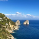 Capri island view featuring iconic Faraglioni sea stacks Capri island view featuring iconic Faraglioni sea stacks - PhotoDune Item for Sale